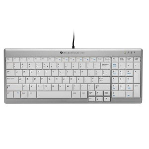 silver slimline keyboard with white keys and black lettering Wired connection