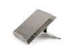 A silver laptop riser with an angle adjustable design, featuring rubber anti-slip feet and an inline document holder slot.
