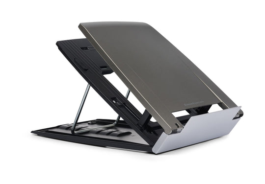 A silver Ergo-Q 330 laptop riser with adjustable height settings, folded to a certain angle, displaying its integral document holder.