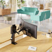 image showing modern office, focusing on the dual trace monitor arm