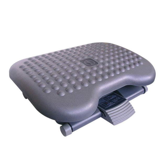 Height-adjustable tilting footrest with massage bumps