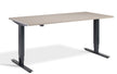Beige desk with black metal legs on a white background