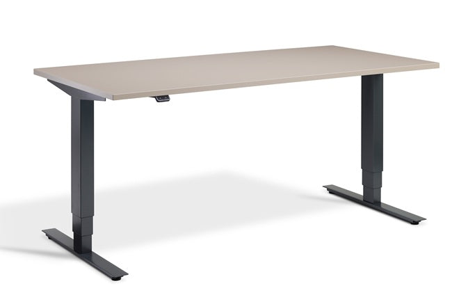 Beige desk with black metal legs on a white background