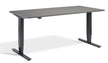 Grey adjustable desk on a white background