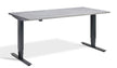 light concrete standing adjustable desk on a white background