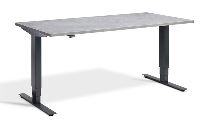 light concrete standing adjustable desk on a white background