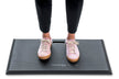 black cushioned mat for standing on