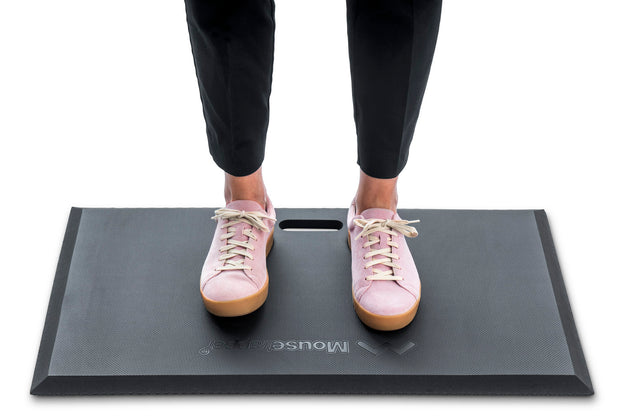 black cushioned mat for standing on