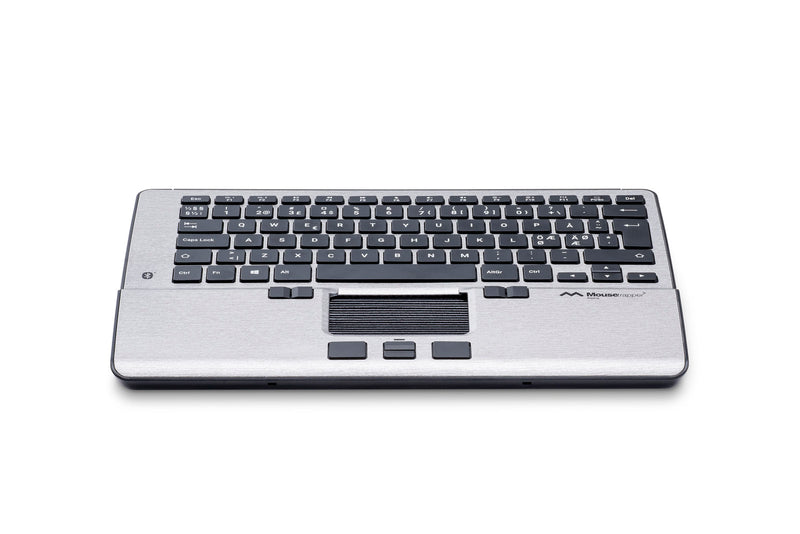 silver unit with inbuilt keyboard and mouse