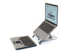 laptop on laptop riser with keyboard and mouse in front