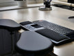 two individual forearm supports clamped on desk
