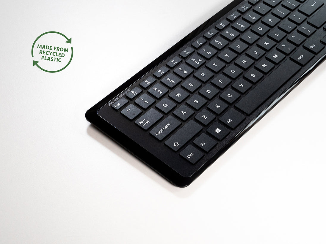black compact keyboard with white lettering