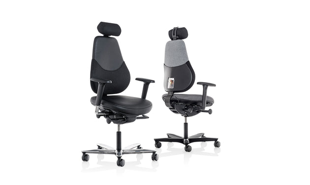 Two ergonomic office chairs on a white background