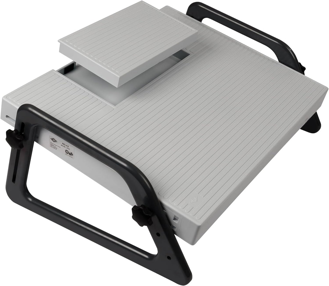 A white and gray Relax footrest with adjustable parts and a compartment for a dictation pedal.