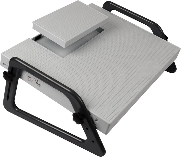 A white and gray Relax footrest with adjustable parts and a compartment for a dictation pedal.