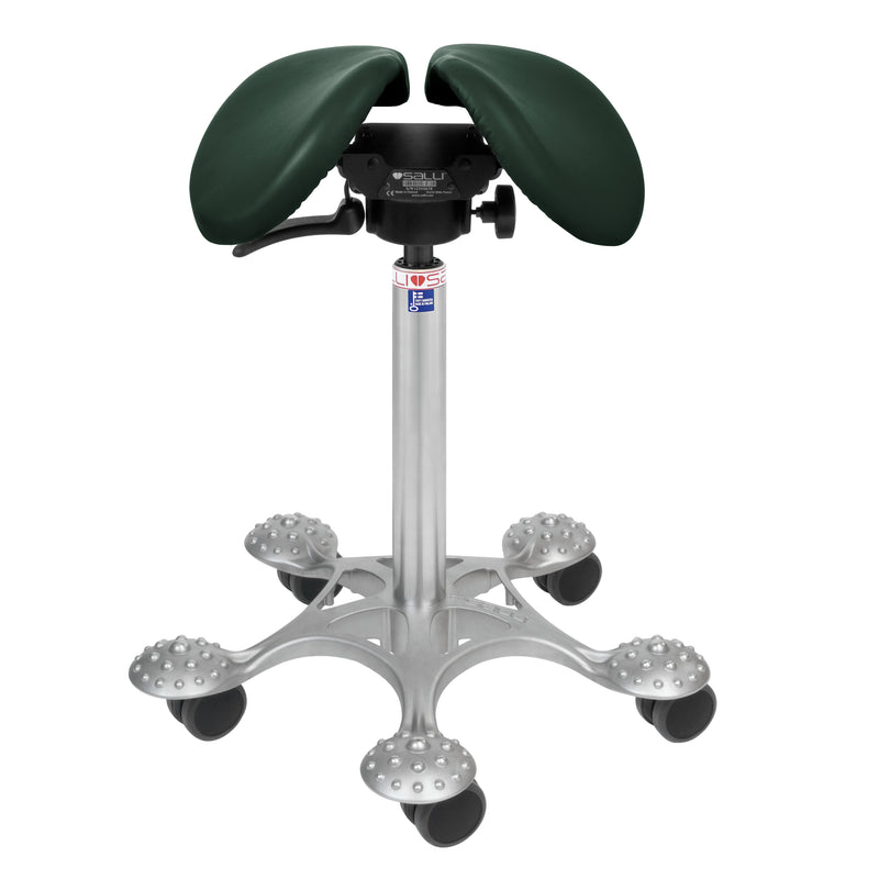 dark green salli swing stool with gap down middle for relieving genital pressure. Silver base with bumps for massaging feet