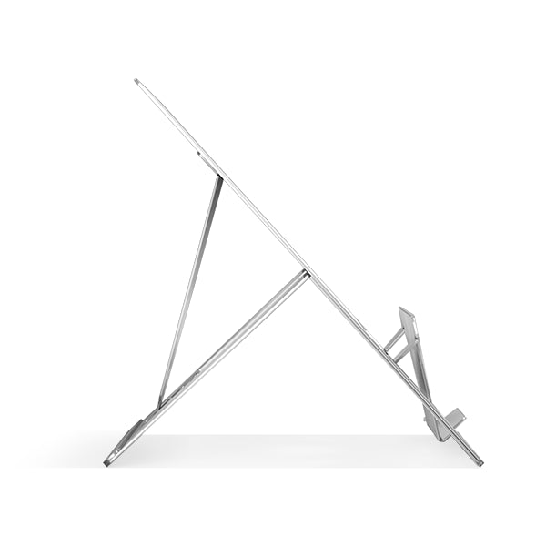A silver laptop stand with in-built document holder, made of aluminum, displayed in a folded position.