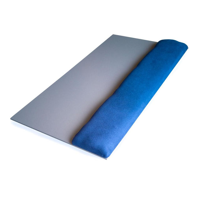 A grey wrist support with a blue pad on one end, designed to be placed on a keyboard surface.