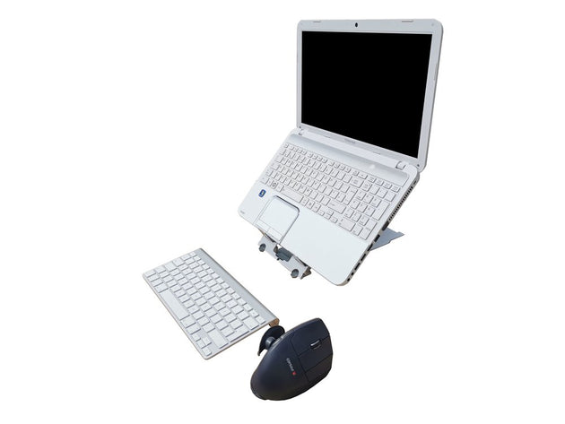 A silver laptop folded open on a stand with a detachable keyboard and a mouse, showcasing a portable ergonomic solution for laptop and tablet use.