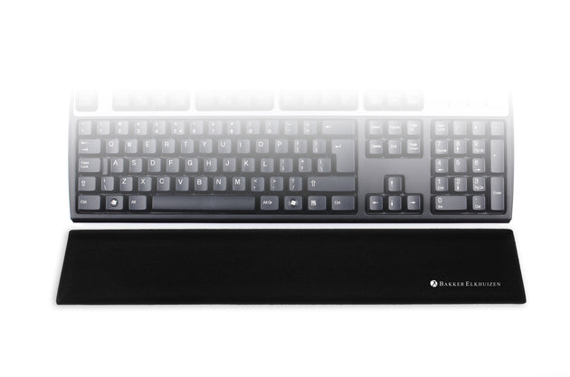 image showing black trapezium standard wrist support in front of a standard size keyboard